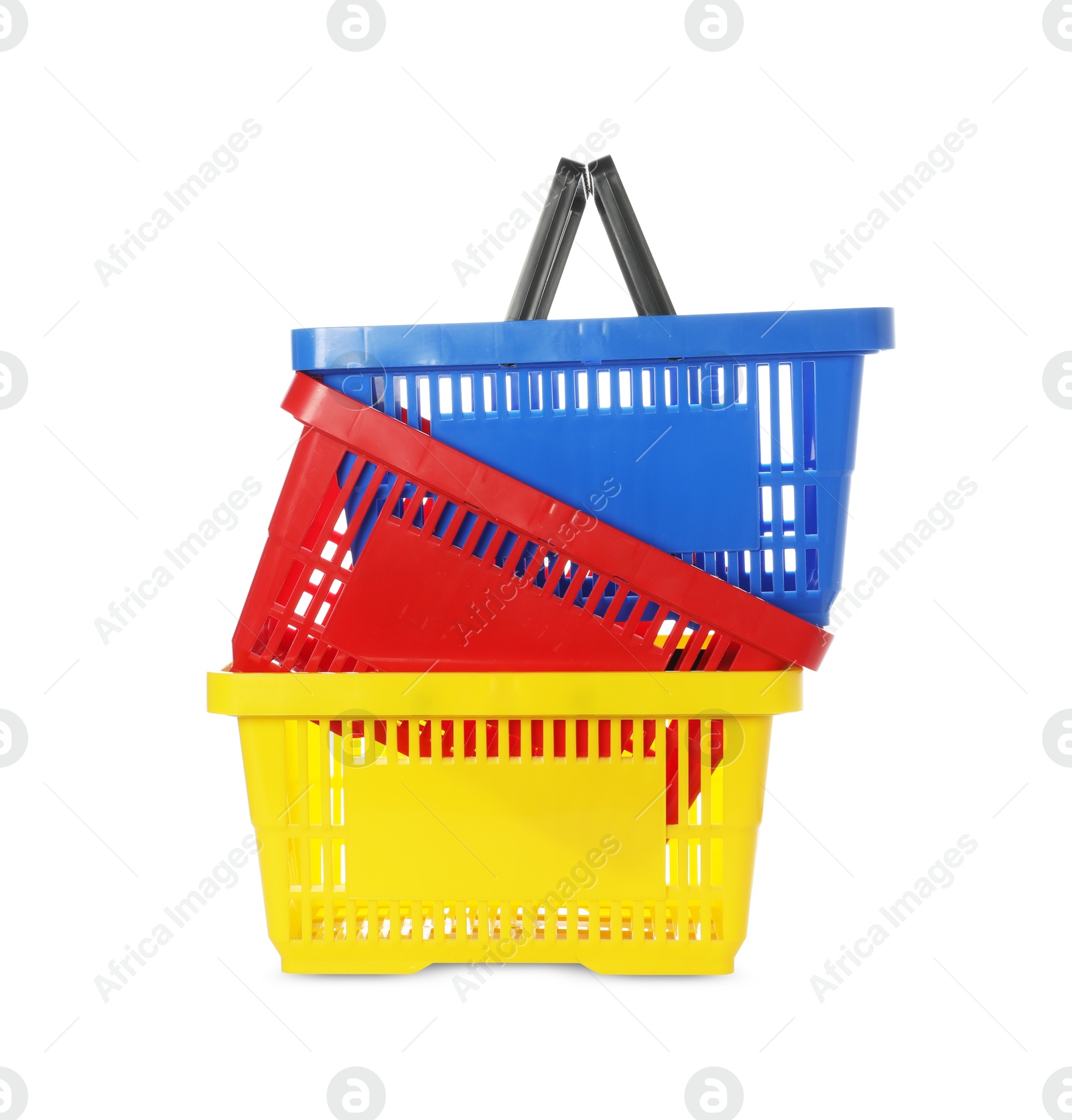 Stack of colorful shopping baskets isolated on white Photo of Stack of colorful shopping baskets isolated on white