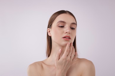 Photo of Portrait of attractive young woman on white background