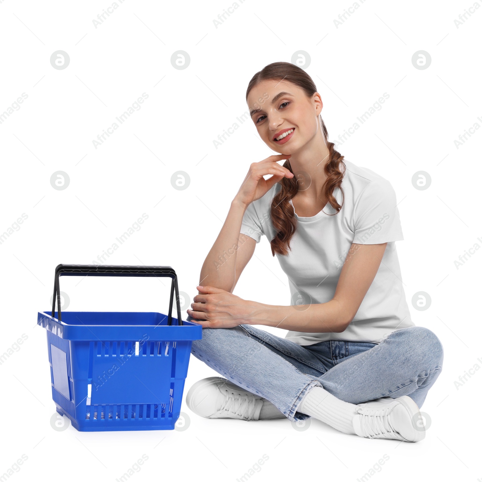 Photo of Woman with plastic shopping basket on white background