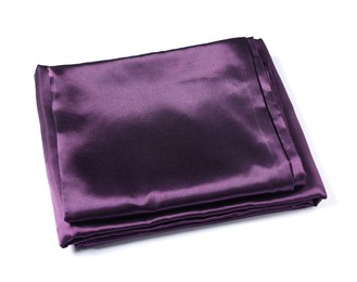Photo of Silky purple bed linens on white background