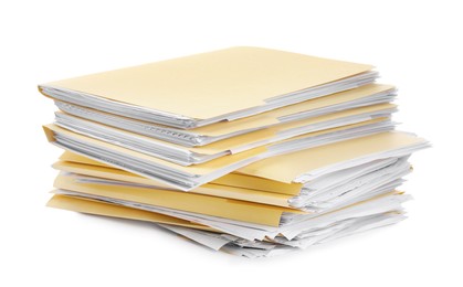 Photo of Stack of file folders with papers isolated on white
