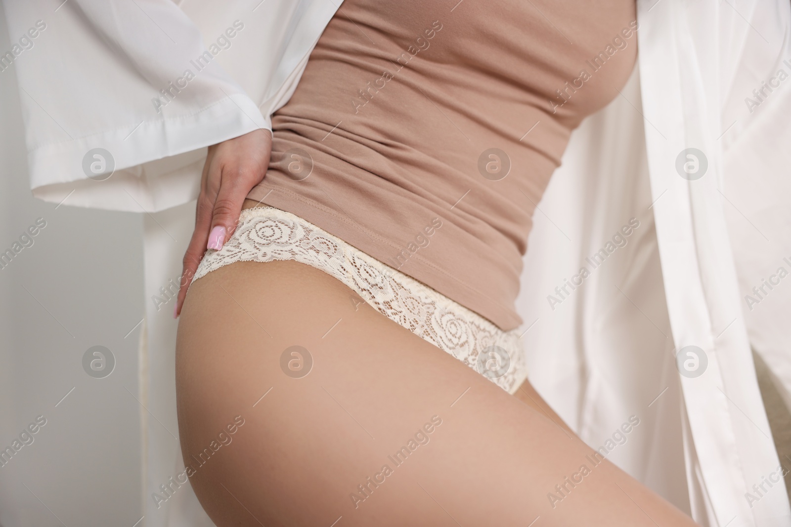 Woman in beautiful lace underwear indoors, closeup Photo of Woman in beautiful lace underwear indoors, closeup