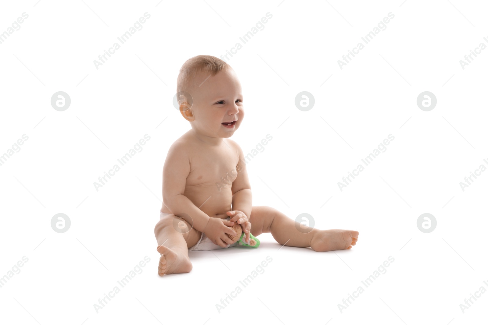 Cute little baby with toy on white background Photo of Cute little baby with toy on white background