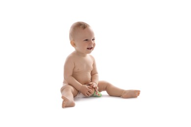 Photo of Cute little baby with toy on white background
