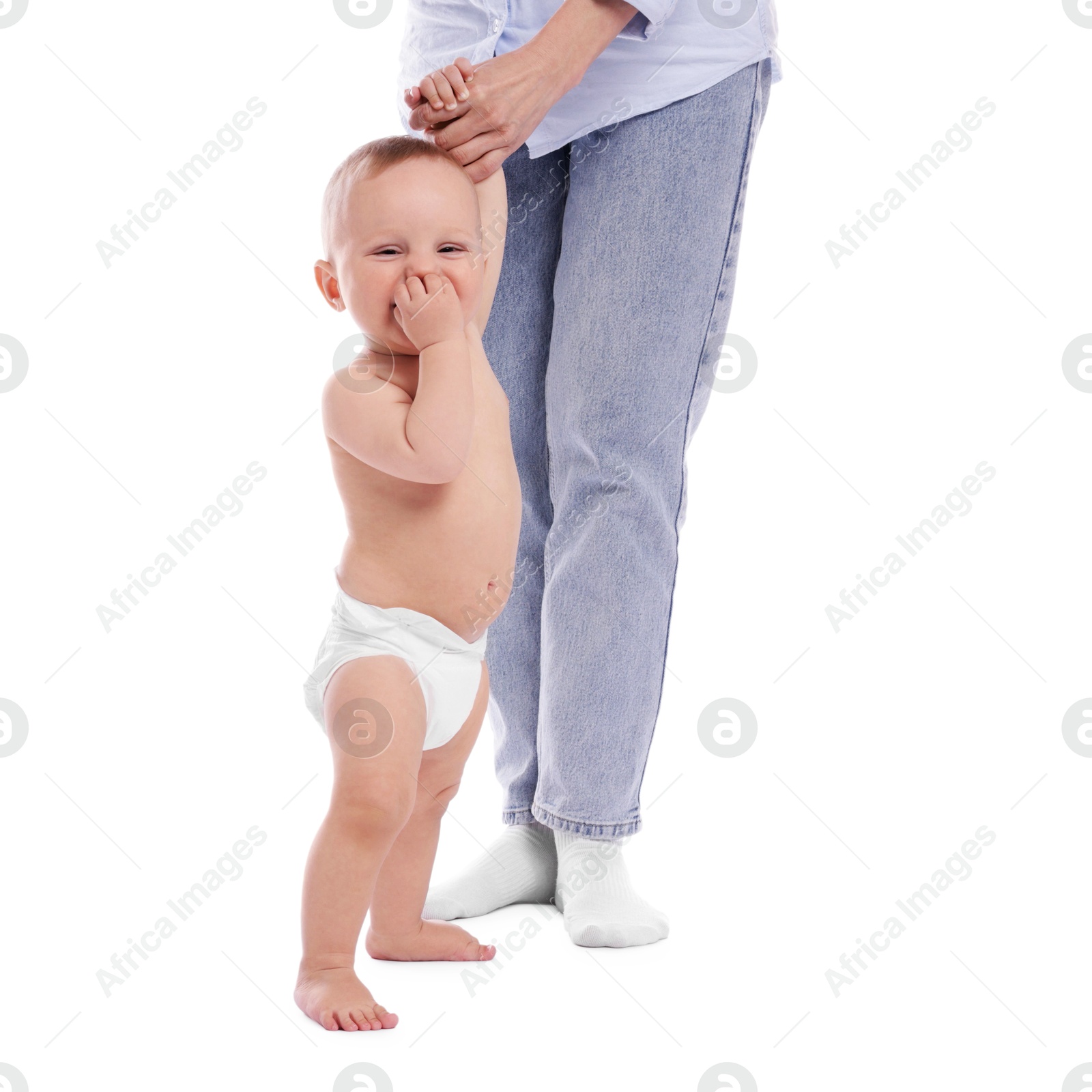 Cute little baby standing on white background Photo of Cute little baby standing on white background