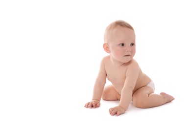 Photo of Cute little baby sitting on white background