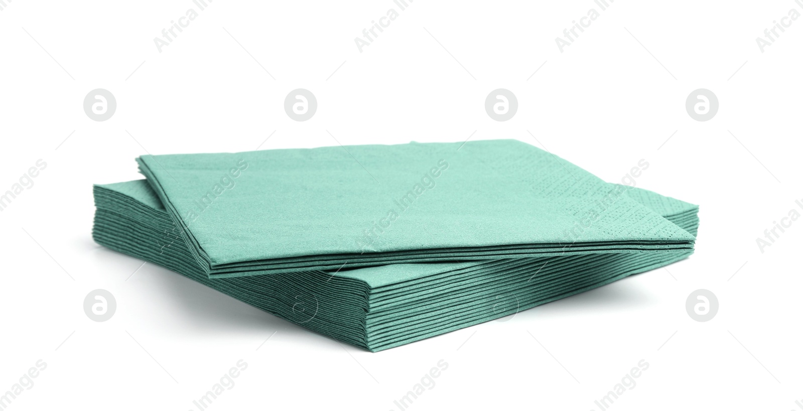 Many green paper handkerchiefs isolated on white Photo of Many green paper handkerchiefs isolated on white