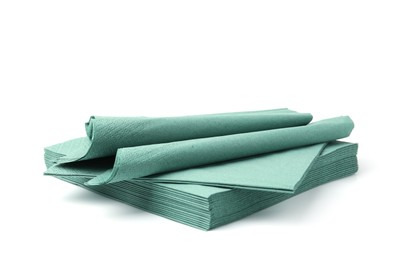 Photo of Many green paper handkerchiefs isolated on white