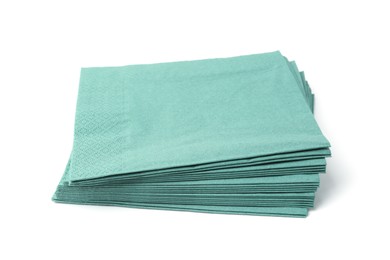 Photo of Many green paper handkerchiefs isolated on white