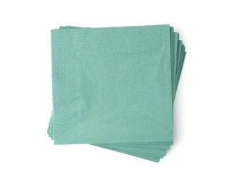 Photo of Many green paper handkerchiefs isolated on white, top view