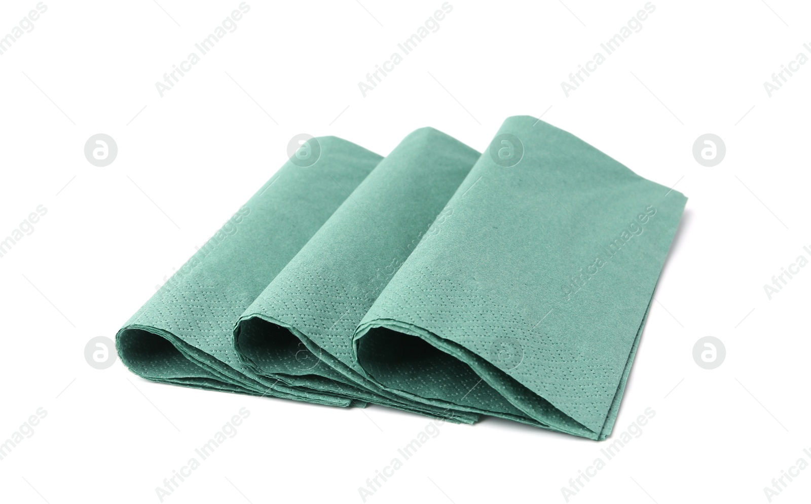 Many green paper handkerchiefs isolated on white Photo of Many green paper handkerchiefs isolated on white