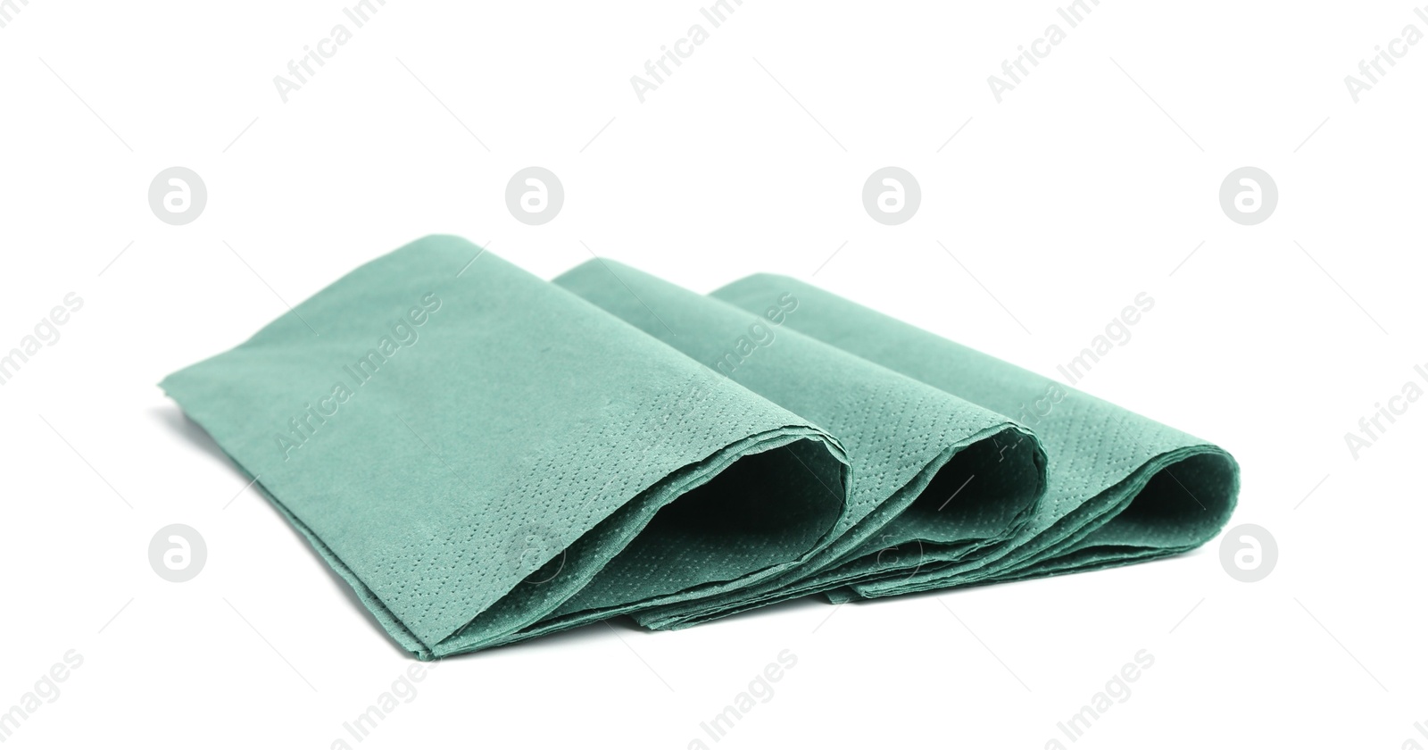 Many green paper handkerchiefs isolated on white Photo of Many green paper handkerchiefs isolated on white