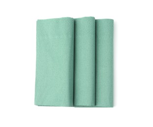 Photo of Green paper handkerchiefs isolated on white, top view