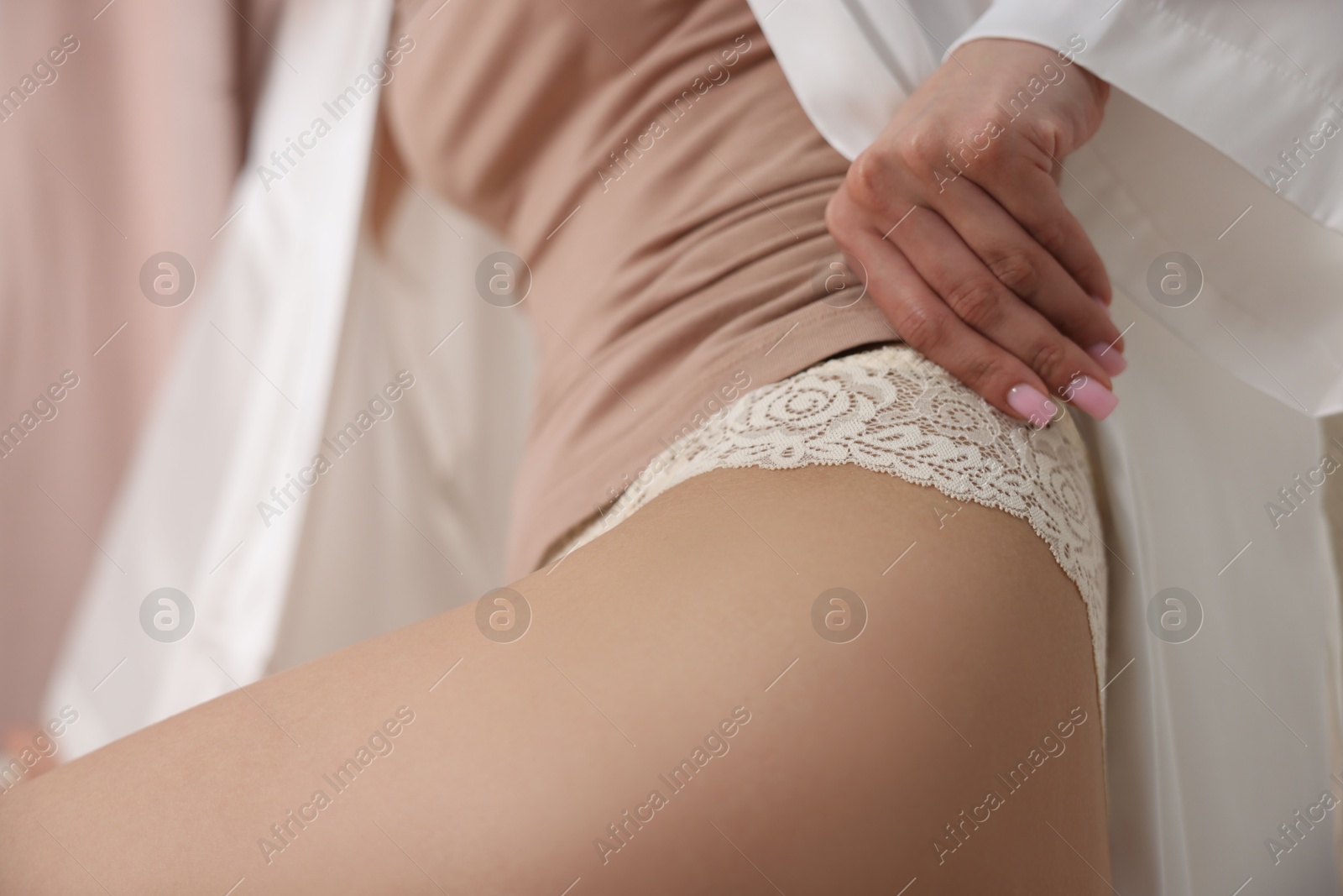 Woman in beautiful lace underwear indoors, closeup Photo of Woman in beautiful lace underwear indoors, closeup