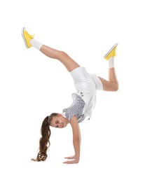 Photo of Girl in stylish clothes dancing on white background