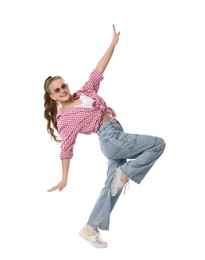 Photo of Girl in stylish clothes and sunglasses dancing on white background