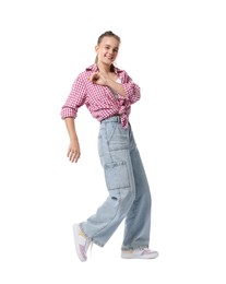 Photo of Girl in stylish clothes dancing on white background