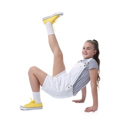 Photo of Girl in stylish clothes dancing on white background