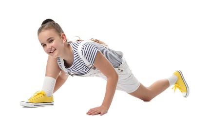 Photo of Girl in stylish clothes dancing on white background