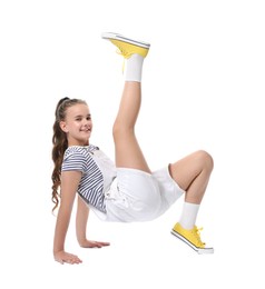 Photo of Girl in stylish clothes dancing on white background