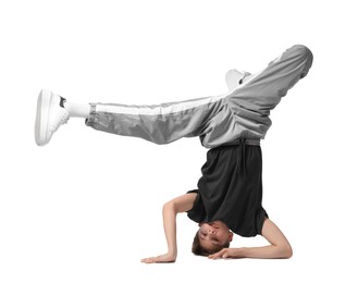 Photo of Boy in stylish clothes dancing on white background