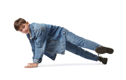 Photo of Boy in stylish clothes dancing on white background