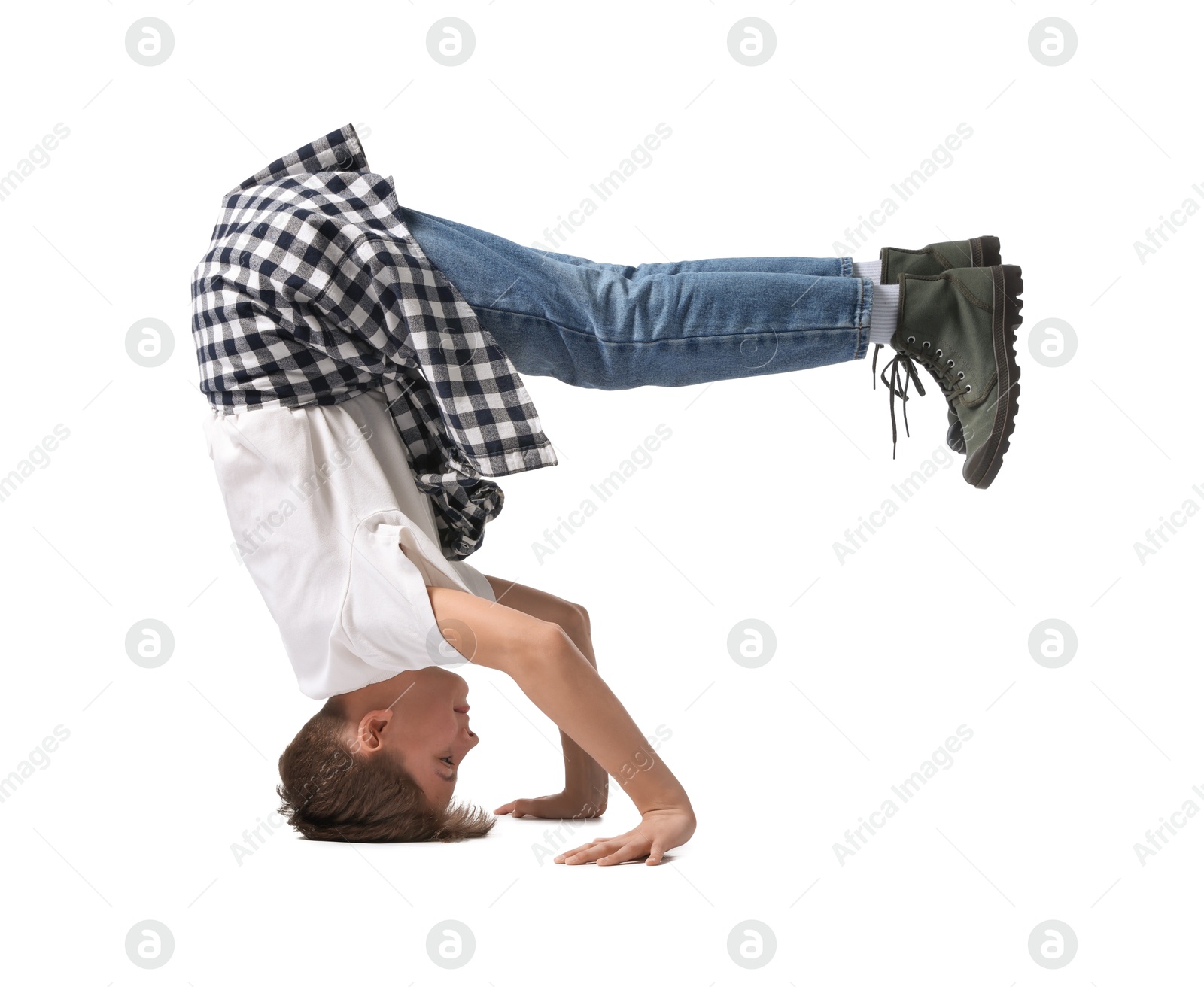 Photo of Boy in stylish clothes dancing on white background