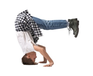 Photo of Boy in stylish clothes dancing on white background
