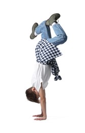 Photo of Boy in stylish clothes dancing on white background