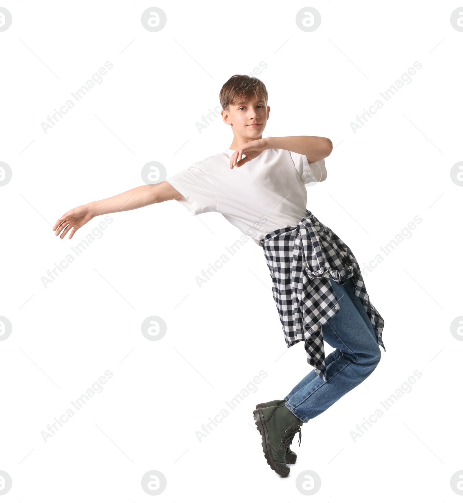 Photo of Boy in stylish clothes dancing on white background