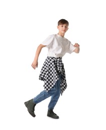 Photo of Boy in stylish clothes dancing on white background