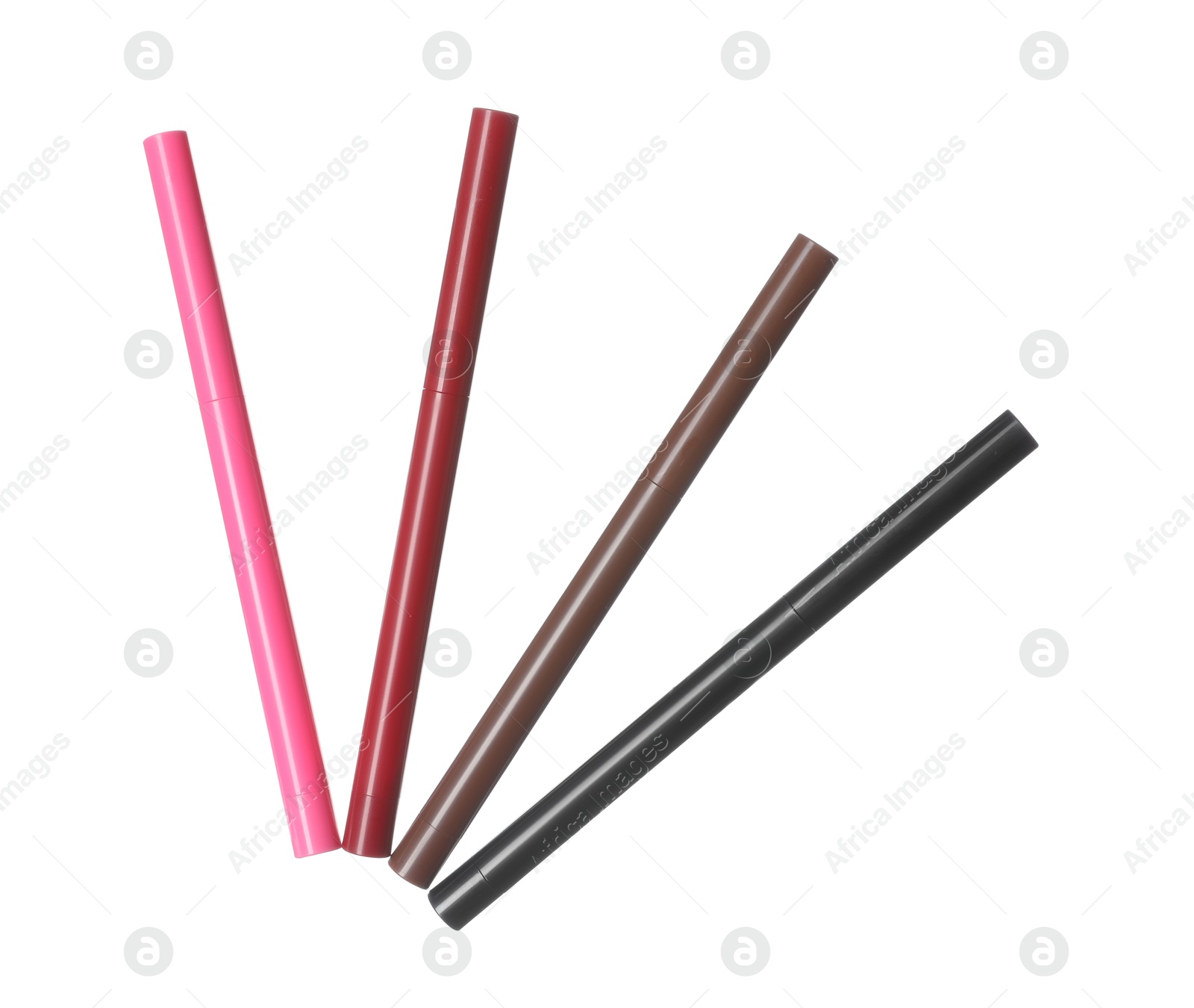 Bright twist up eye pencils isolated on white Photo of Bright twist up eye pencils isolated on white