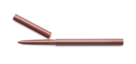 Photo of Brown twist up eye pencil isolated on white, top view