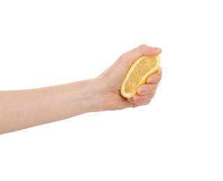 Photo of Woman squeezing lemon on white background, closeup