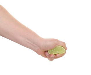 Photo of Woman squeezing lime on white background, closeup