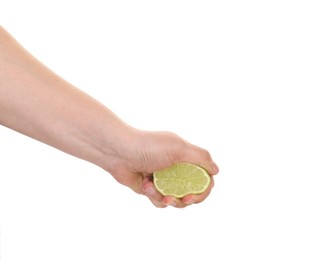 Photo of Woman squeezing lime on white background, closeup