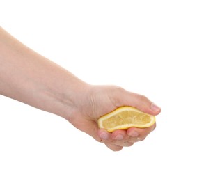 Photo of Woman squeezing lemon on white background, closeup