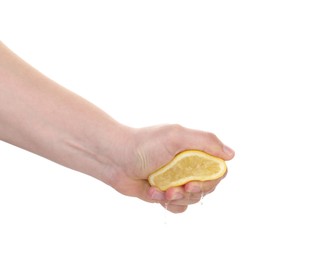 Photo of Woman squeezing lemon on white background, closeup