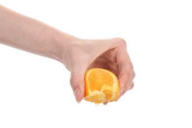 Photo of Woman squeezing orange on white background, closeup