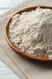 Photo of Pile of flour on table, closeup view