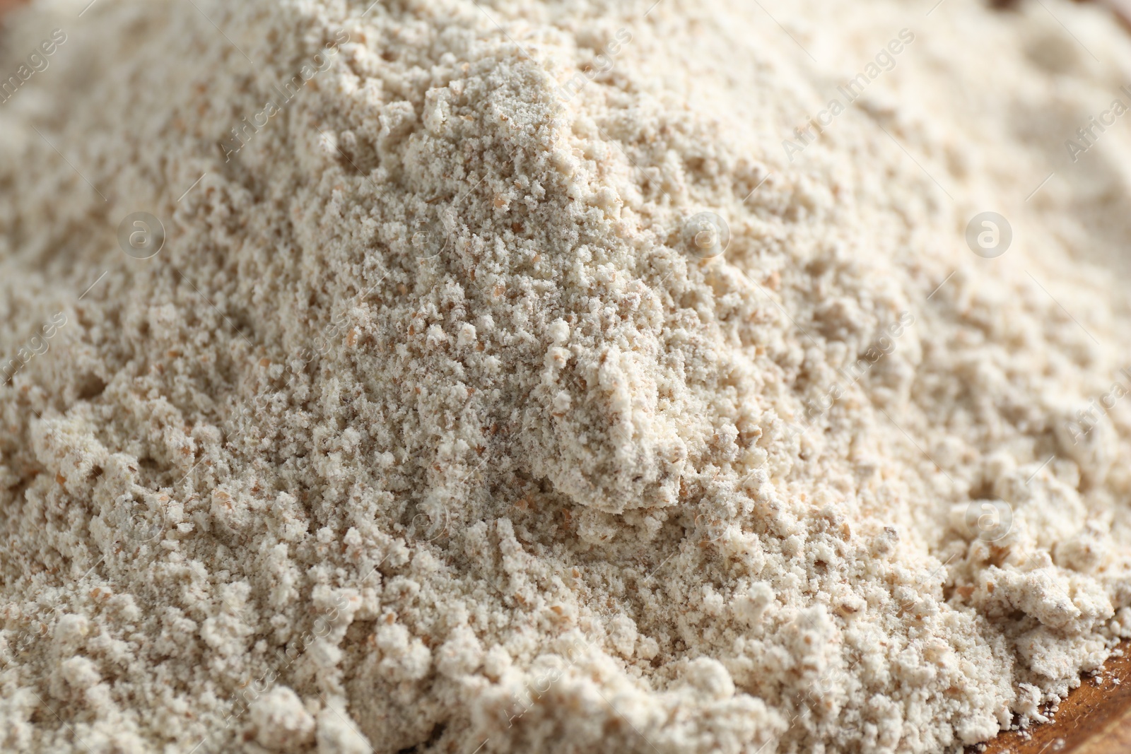 Photo of Pile of flour as background, closeup view