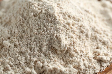 Photo of Pile of flour as background, closeup view