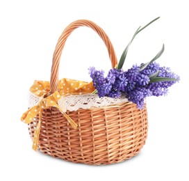 Photo of Beautiful colorful flowers in basket isolated on white