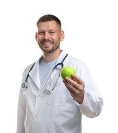 Photo of Nutritionist with green apple and stethoscope on white background