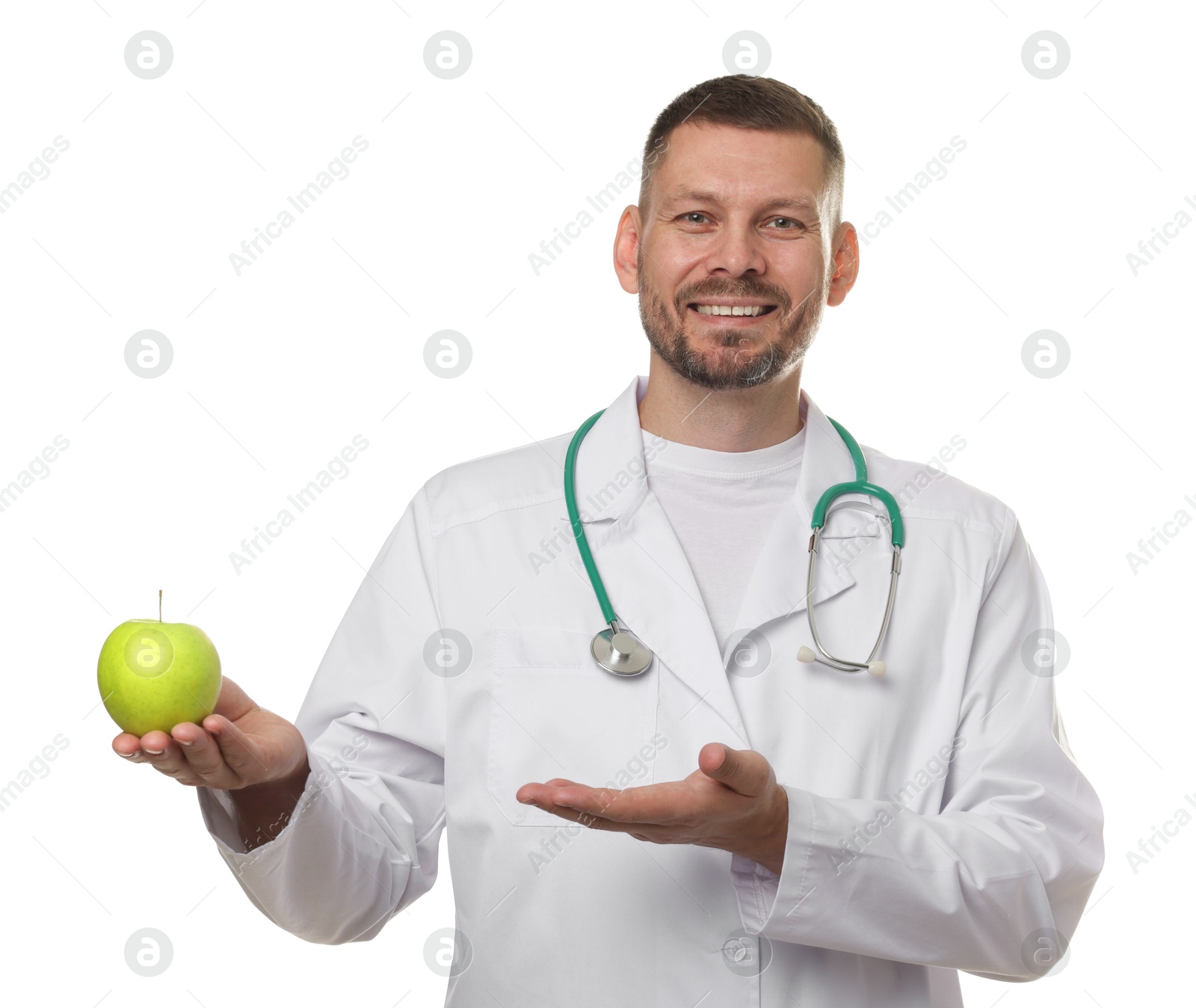 Nutritionist with green apple and stethoscope on white background Photo of Nutritionist with green apple and stethoscope on white background