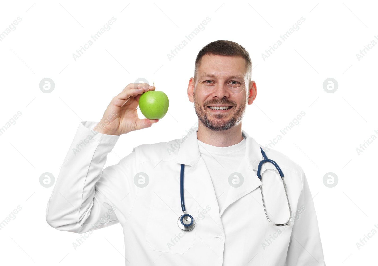Photo of Nutritionist with green apple and stethoscope on white background