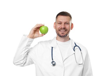 Photo of Nutritionist with green apple and stethoscope on white background