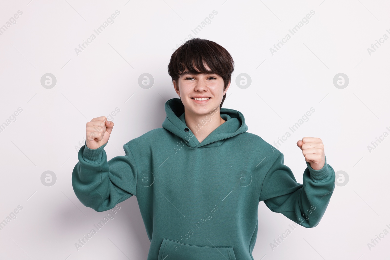 Portrait of teenage boy on white background Photo of Portrait of teenage boy on white background