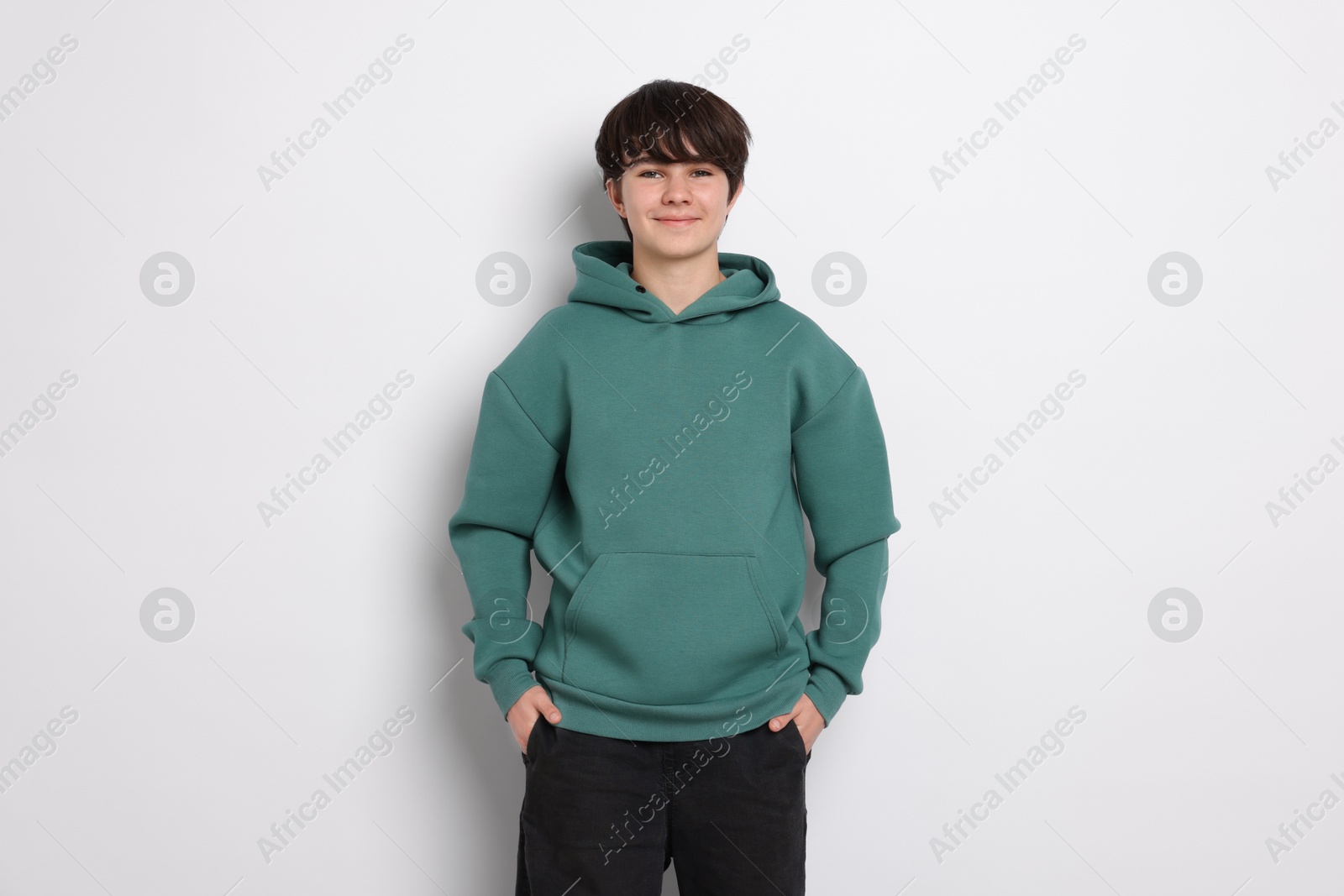Portrait of teenage boy on white background Photo of Portrait of teenage boy on white background