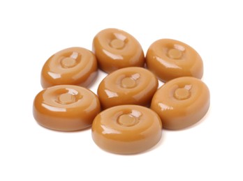 Photo of Tasty hard toffee candies isolated on white